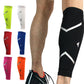 Compression calf sleeve worn on leg, black fabric with white printed chevron logo