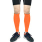 Compression calf sleeves, orange breathable pair covering calves for running