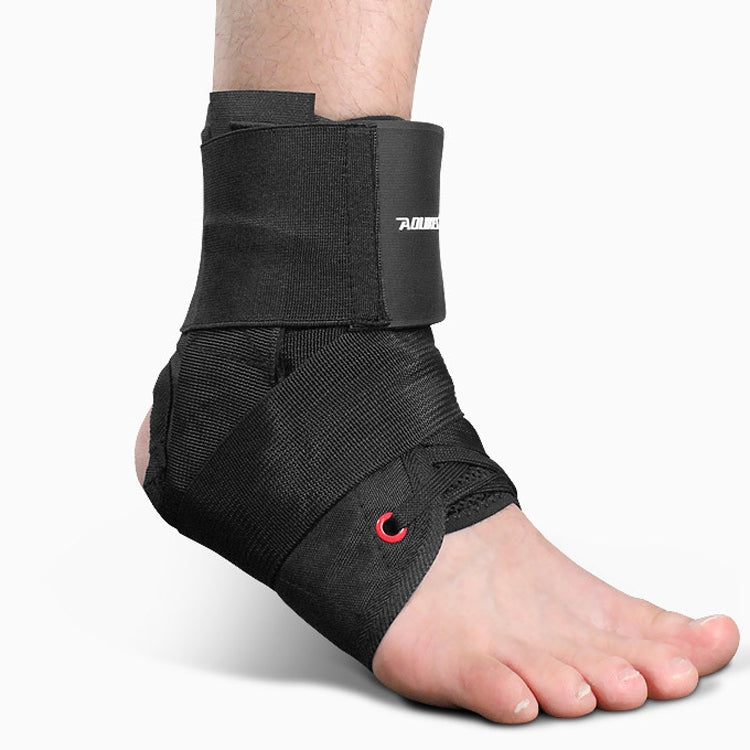 Black ankle brace with eight-shaped support band and red accent on side