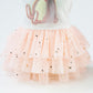 Peach-pink tulle skirt with star pattern and layered mesh ruffle hem