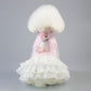 Pet rabbit skirt featuring a pink neck top, white ruffled tutu with gold stars