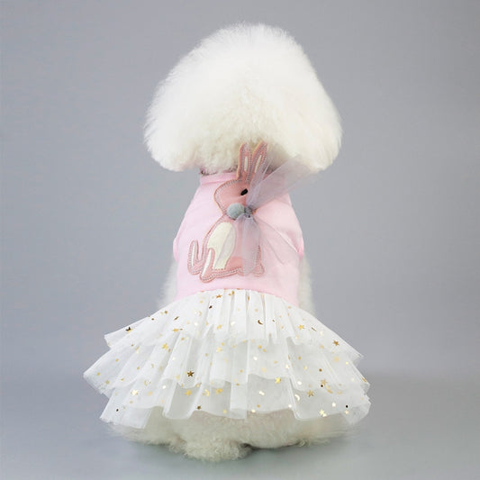 Pet rabbit skirt featuring a pink neck top, white ruffled tutu with gold stars