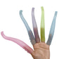 Octopus tentacle finger covers on a hand, pastel tentacles in several colors