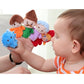 Child playing with assorted finger plush character dolls