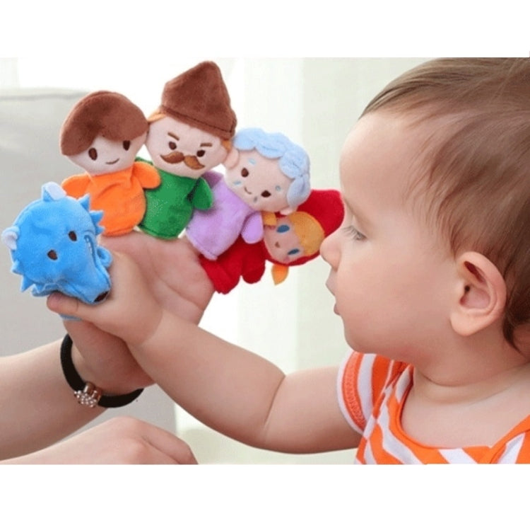 Child playing with assorted finger plush character dolls