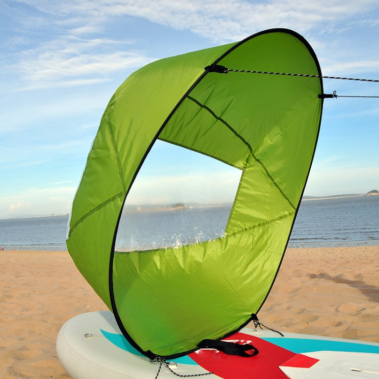 Downwind kayak sail, green inflatable sail with black rim and clear window panel