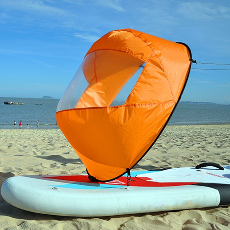Downwind kayak sail, orange inflatable sail with black rim and clear window panel on board