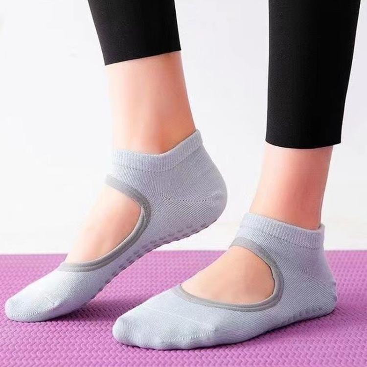 Backless non-slip yoga socks in light gray with open back and grip sole