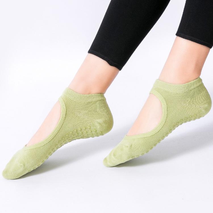Backless non-slip yoga socks in light green with open back and grip sole