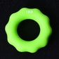 Green 15LB silicone finger exercise grip ring with round center opening.