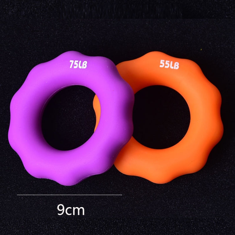 Purple 75LB and orange 55LB silicone finger grip rings with round openings.