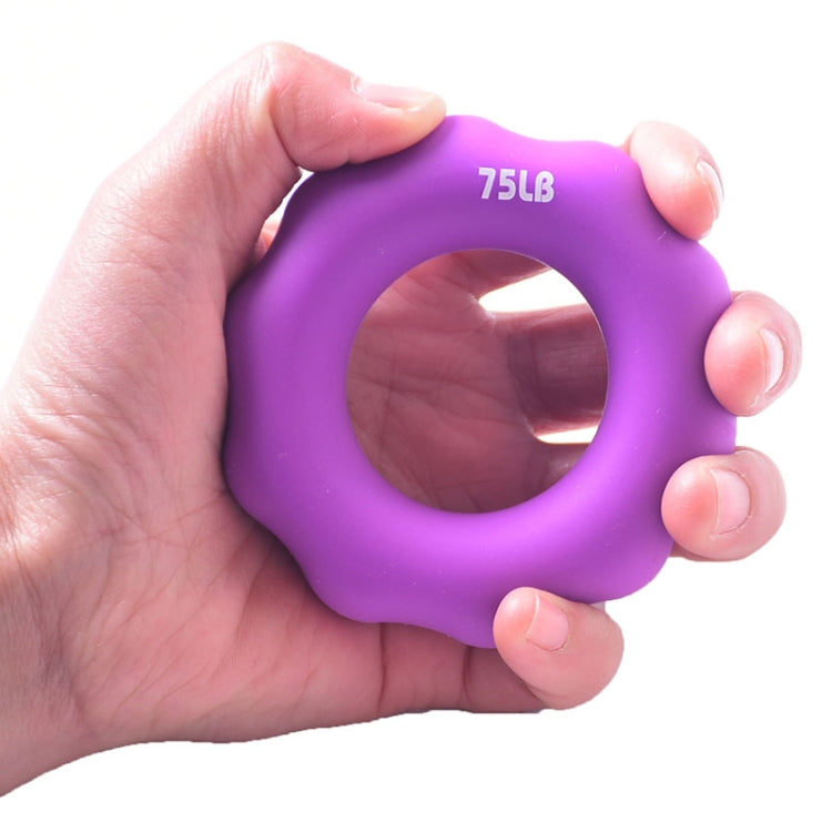 Purple 75LB silicone finger exercise grip ring with round center opening.