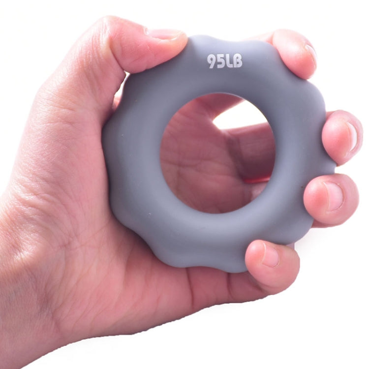 Gray 95LB silicone finger exercise grip ring with round center opening.