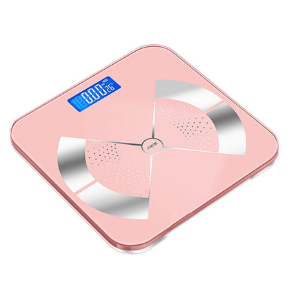 Pink digital body fat scale with blue LCD readout and sensor electrode fan design
