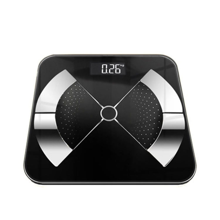 Black digital body fat scale with dark LCD readout and four-quadrant sensor grid
