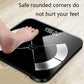 Digital body weight scale with rounded corners and LED display, foot resting on the panel