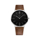 Men’s quartz wristwatch with black dial, silver case, and brown leather strap