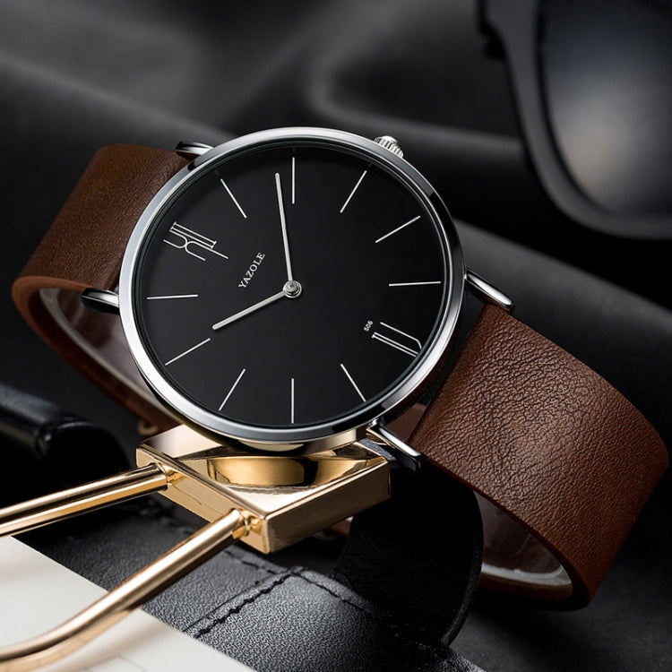 Men’s quartz wristwatch with black dial, silver case, and brown leather strap