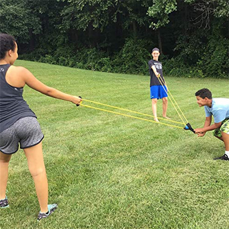 Outdoor water balloon launcher using yellow elastic lines and hand grips.