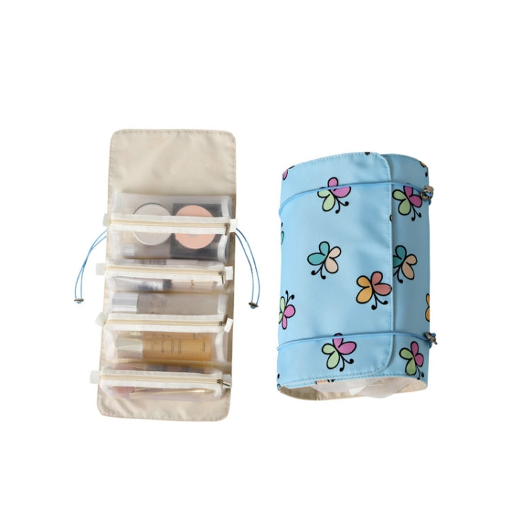 Light blue cosmetics storage bag with removable clear pouches and floral pattern
