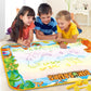 Children drawing on dinosaur magic water drawing mat with water pen