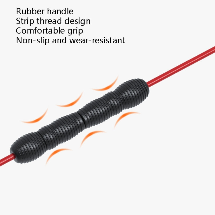 Black ribbed grip section on red fitness elastic training stick, textured for control