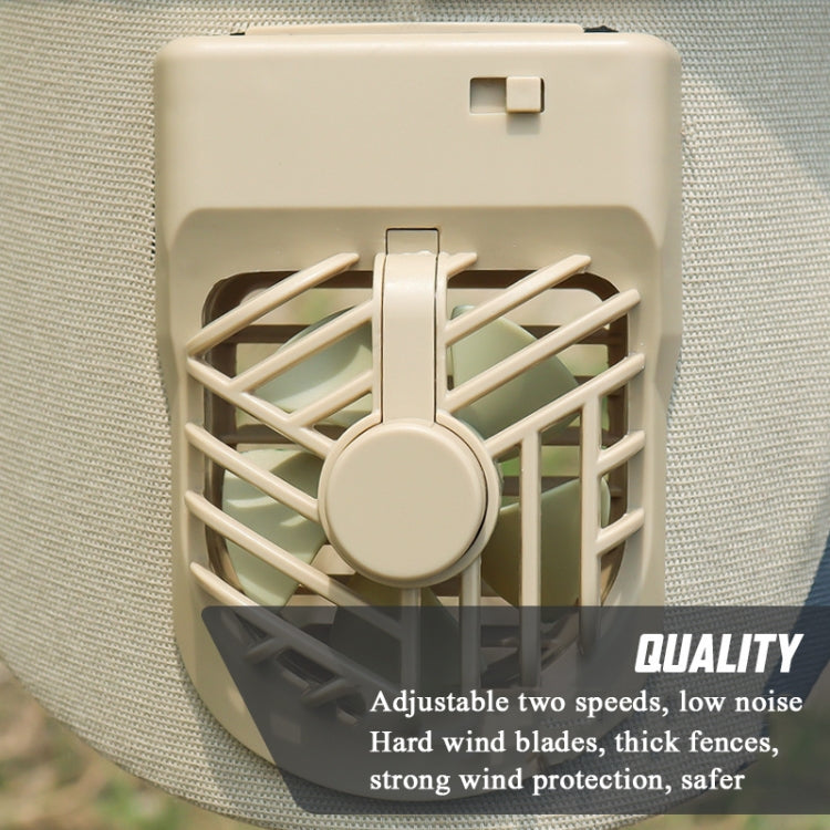 Beige fan vent housing with visible fan blades and protective grille on sun cap