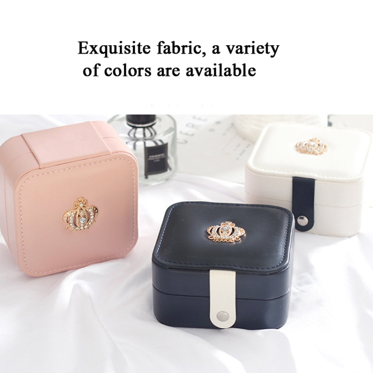 Small jewelry box set in pink, black, and white with decorative top clasps