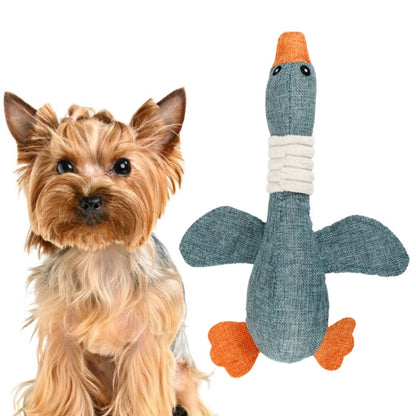 Blue gray goose plush dog toy with orange beak and wing tips, textured body