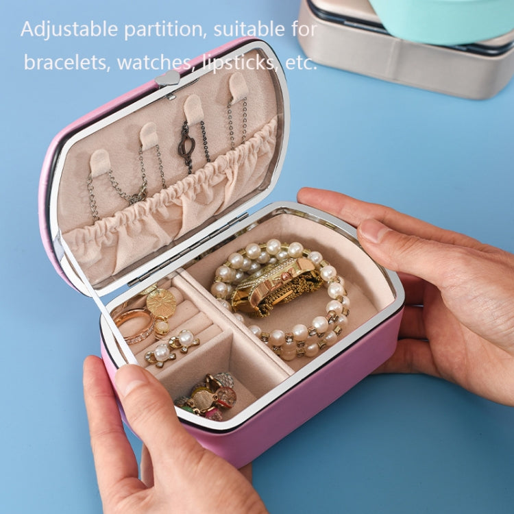 Pink travel jewelry storage box with adjustable partitions and necklace storage, open