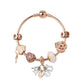 Rose gold beaded charm bracelet featuring a heart lock centerpiece and dangling hearts