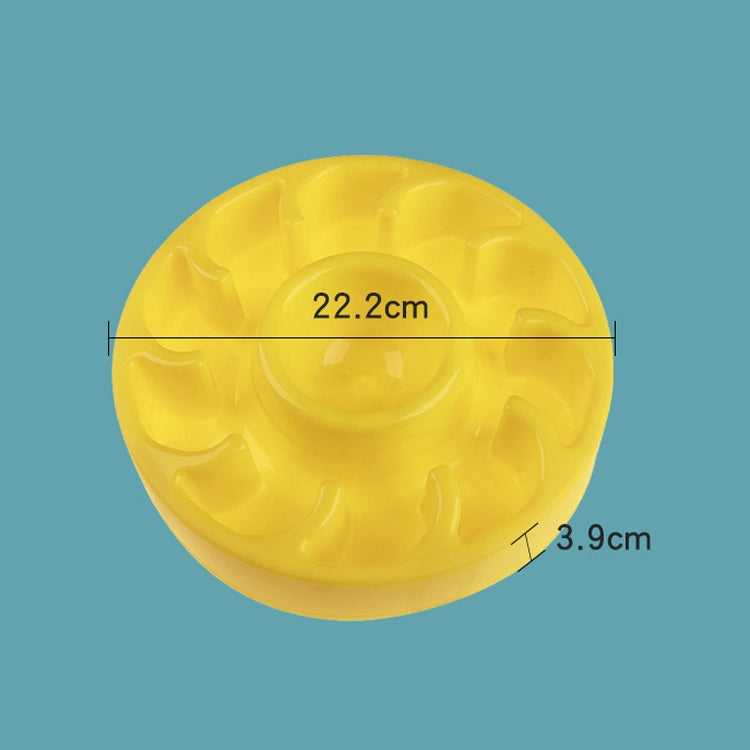 Yellow round slow food pet bowl with raised feeding ridges and center cup