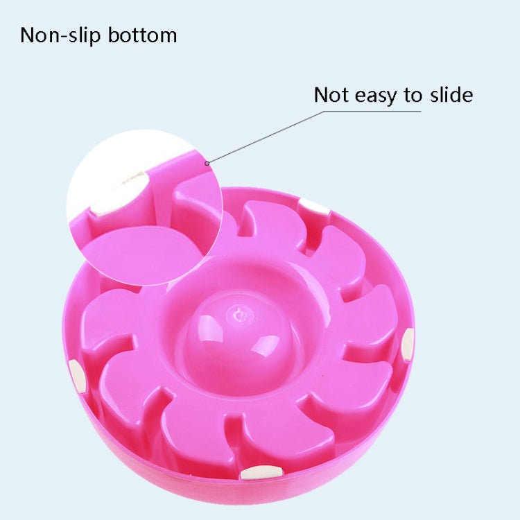 Pink slow food pet bowl with raised feeding ridges and a centered feeding cup
