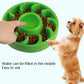 Green slow-feeder dog bowl with raised channels and center refill cup