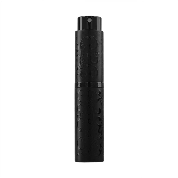 Black embossed metal perfume spray bottle with twist-top nozzle, 10ml.