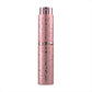 Pink embossed metal perfume spray bottle with twist-top nozzle, 10ml.