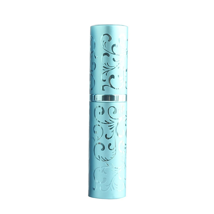 Blue embossed metal perfume spray bottle with twist-top nozzle, 10ml.
