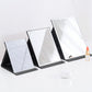 Set of folding desktop makeup mirrors with clear glass and black PU leather bases