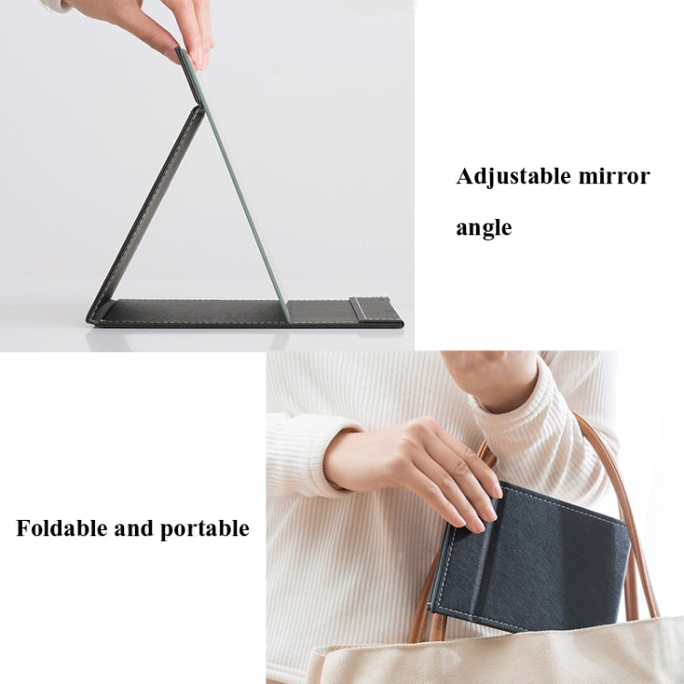 Folding desktop makeup mirror with black PU leather base and adjustable stand