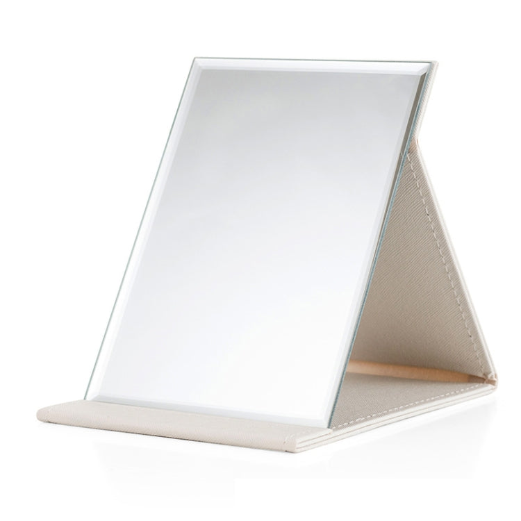 Folding desktop makeup mirror with white glass and beige PU leather base stand
