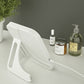 White folding LED makeup mirror on countertop with standing base