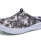 Breathable half slipper shoes featuring black floral print and white platform sole