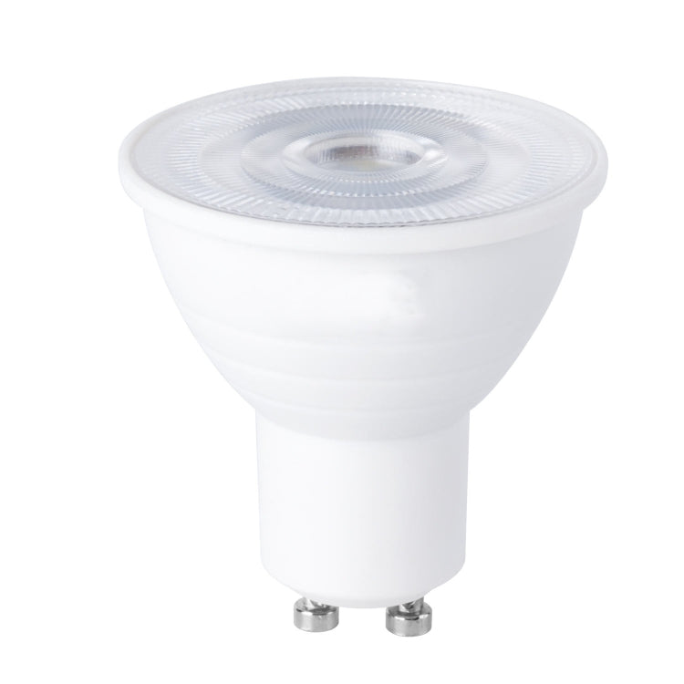 White LED light bulb with clear lens panel on top and two metal pins
