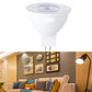 LED light bulb with white cup body, clear top lens, and two metal pins