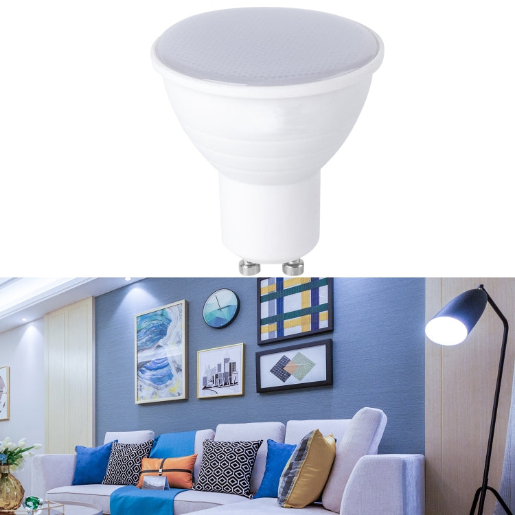 White LED bulb with gray diffused lens top and two metal pins base