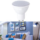White LED light cup bulb with frosted gray top and two metal pins