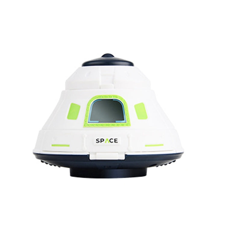 White and navy space return cabin toy model with green side panels and dome top