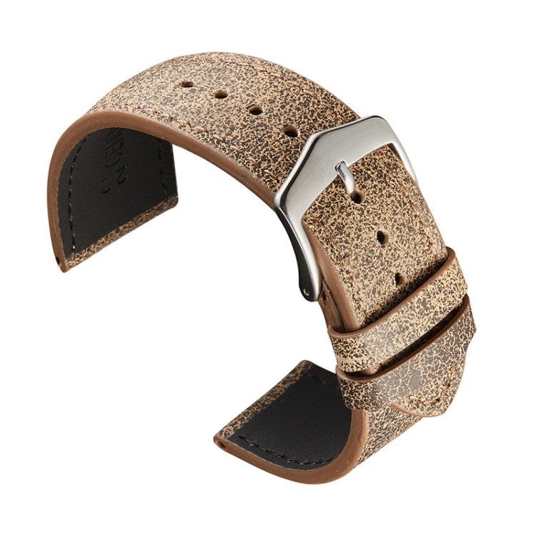 Light coffee leather watch strap with silver buckle, perforation holes and stitched lining