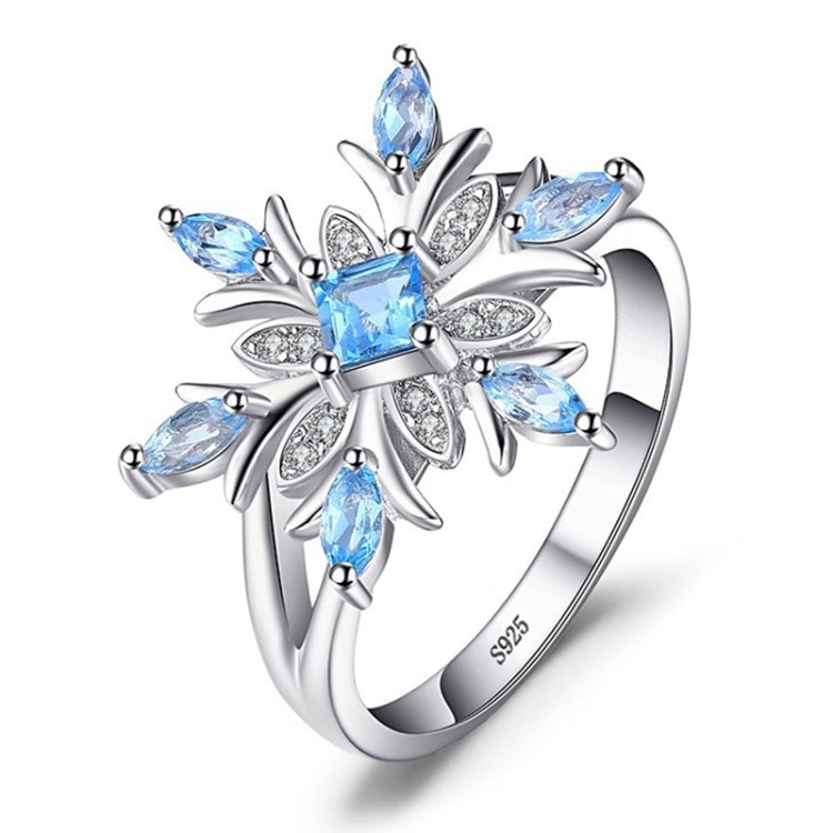 925 sterling silver snowflake flower ring with blue topaz accents