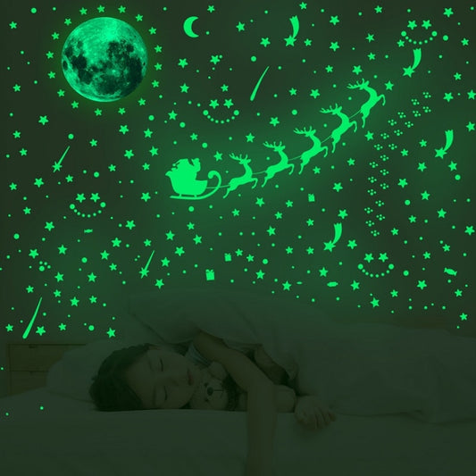 Luminous green moon, stars and Christmas sleigh wall stickers set